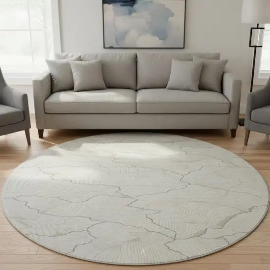 8' Ivory Taupe And Gray Abstract Washable Round Rug With UV Protection Photo 2