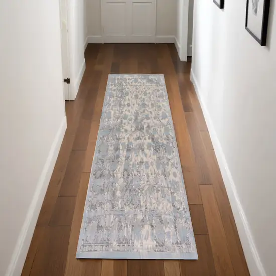 8' Ivory Taupe and Blue Abstract Power Loom Worn Faded Runner Rug Photo 1