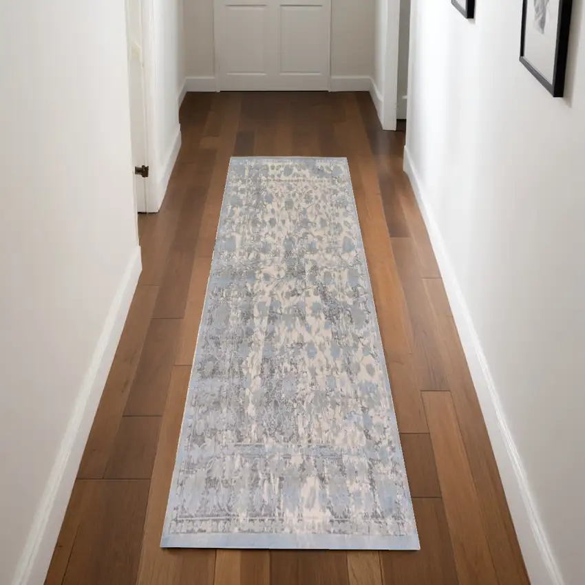 8' Ivory Taupe and Blue Abstract Power Loom Worn Faded Runner Rug Photo 1