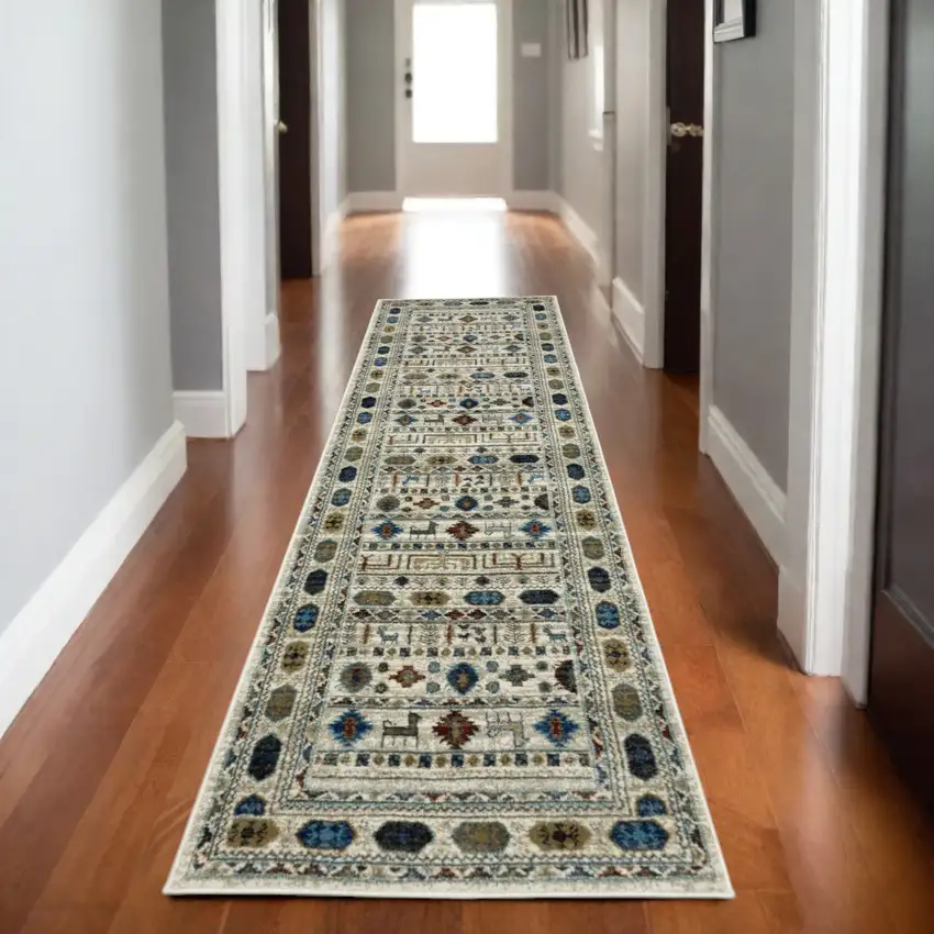 8' Ivory Teal And Gray Tribal Runner Rug Photo 1