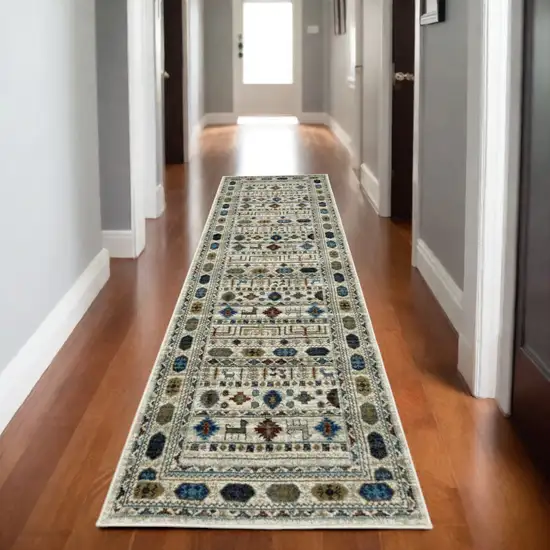 8' Ivory Teal And Gray Tribal Runner Rug Photo 1