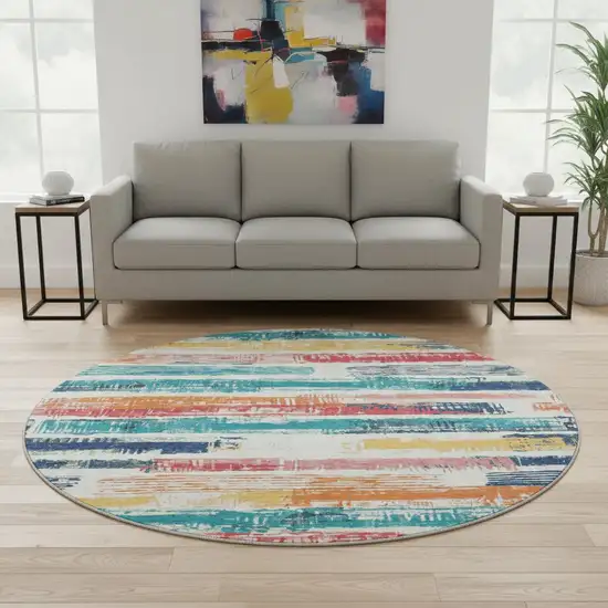 8' Ivory Teal And Orange Striped Washable Round Rug With UV Protection Photo 2
