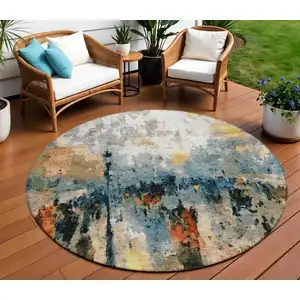 Photo of 8' Ivory Yellow Blue And Beige Round Abstract Washable Indoor Outdoor Area Rug