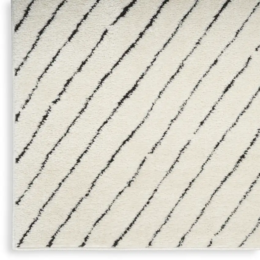 10' Ivory and Black Geometric Runner Rug Photo 5