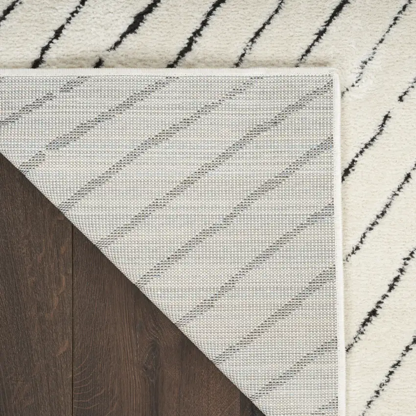 10' Ivory and Black Geometric Runner Rug Photo 9