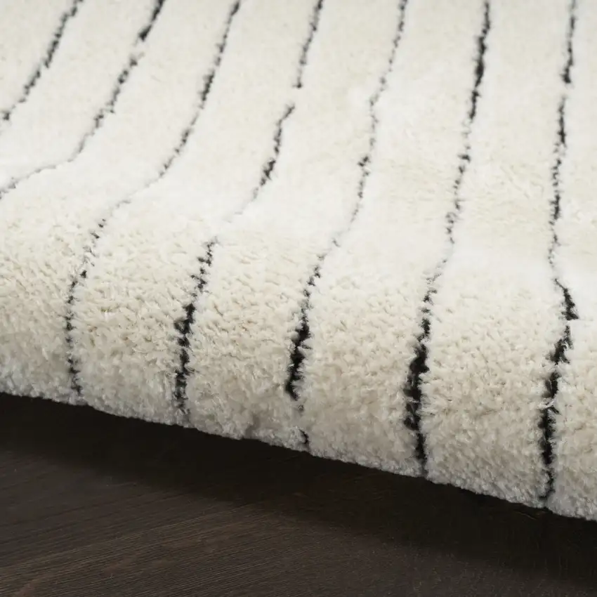 10' Ivory and Black Geometric Runner Rug Photo 5