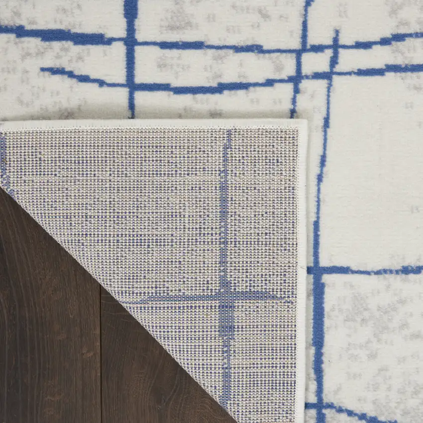 8' Ivory and Blue Abstract Distressed Non Skid Runner Rug Photo 8