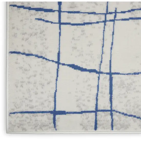 8' Ivory and Blue Abstract Distressed Non Skid Runner Rug Photo 6