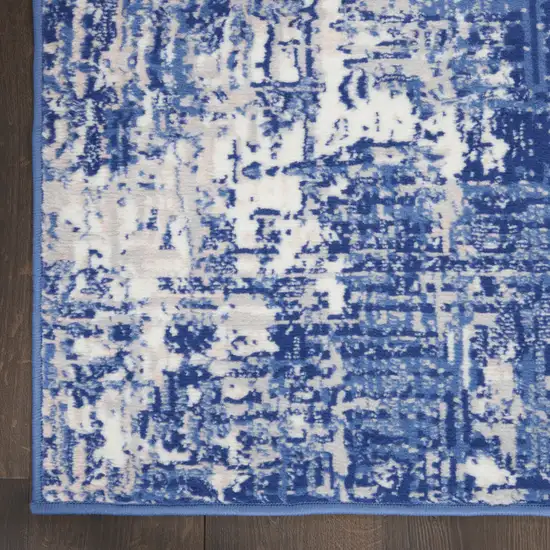 8' Ivory and Blue Abstract Distressed Non Skid Runner Rug Photo 9
