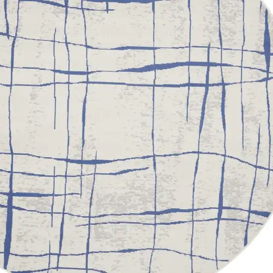 8' Ivory and Blue Abstract Distressed Round Rug Photo 7