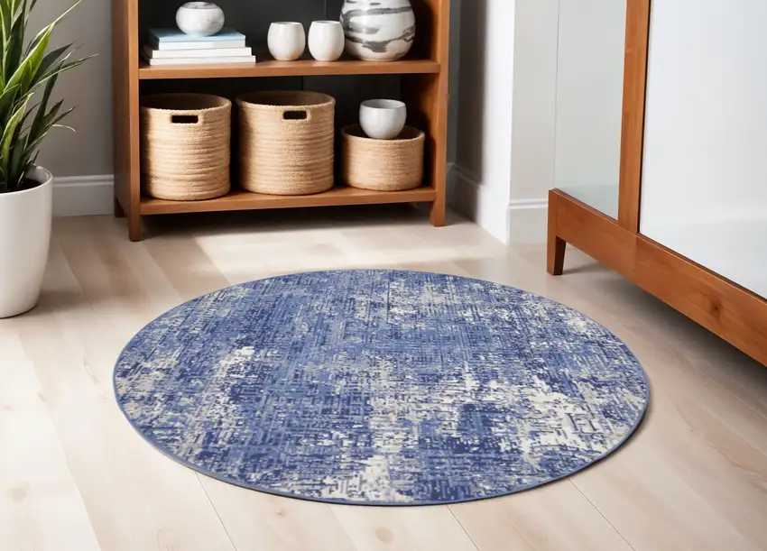 5' Ivory and Blue Abstract Distressed Round Rug Photo 1