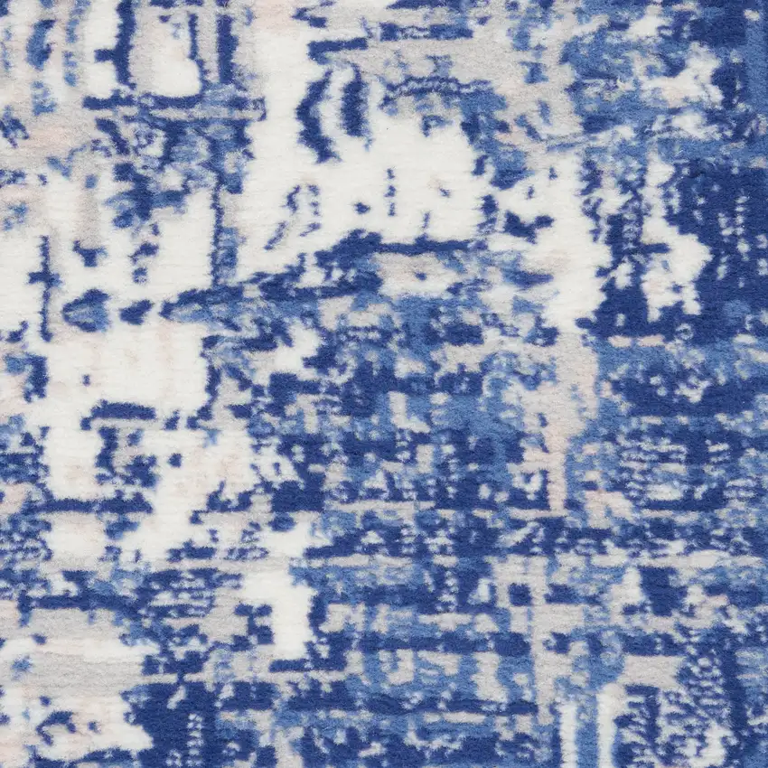 5' Ivory and Blue Abstract Distressed Round Rug Photo 9
