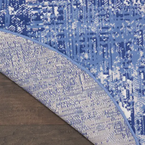 8' Ivory and Blue Abstract Distressed Round Rug Photo 7
