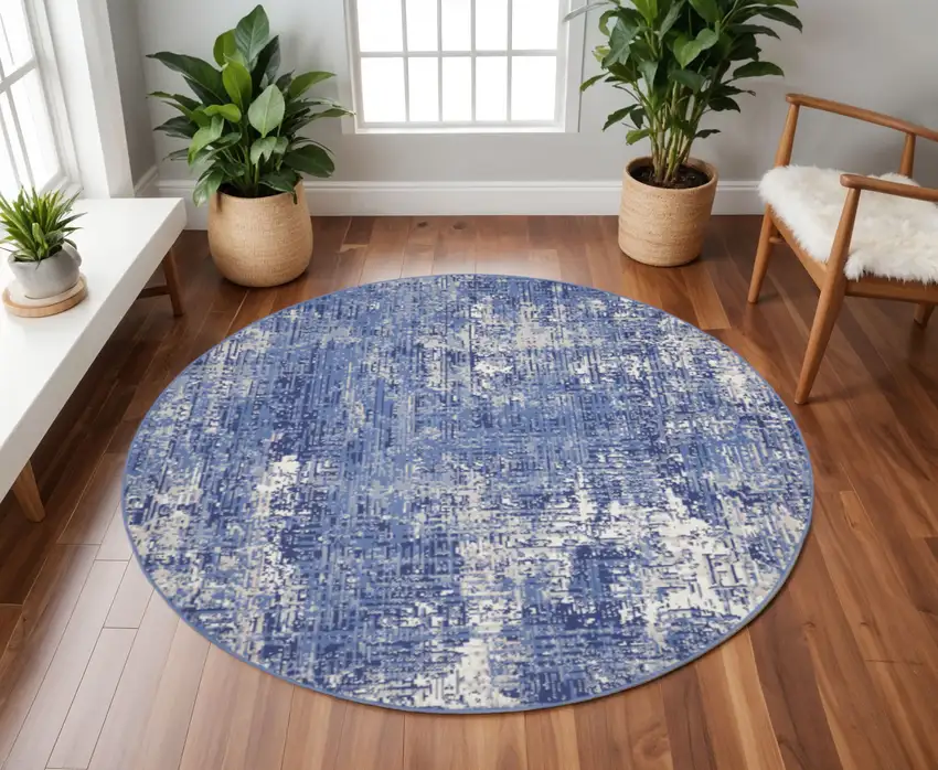 8' Ivory and Blue Abstract Distressed Round Rug Photo 2