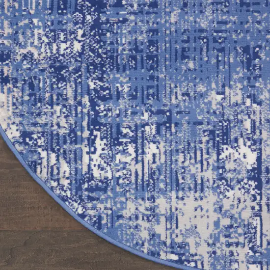 8' Ivory and Blue Abstract Distressed Round Rug Photo 8