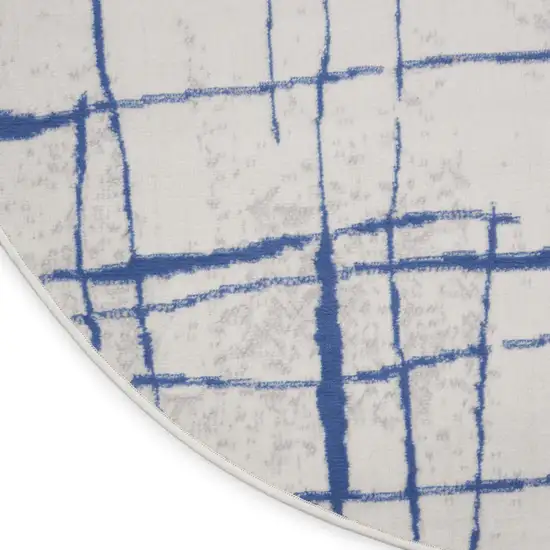 5' Ivory and Blue Abstract Geometric Distressed Round Rug Photo 8