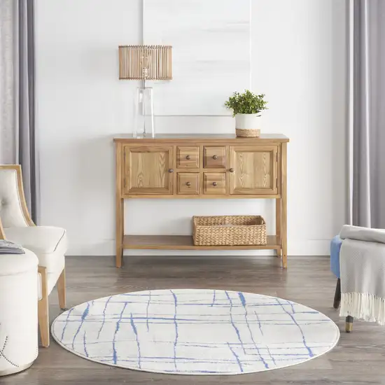 5' Ivory and Blue Abstract Geometric Distressed Round Rug Photo 5