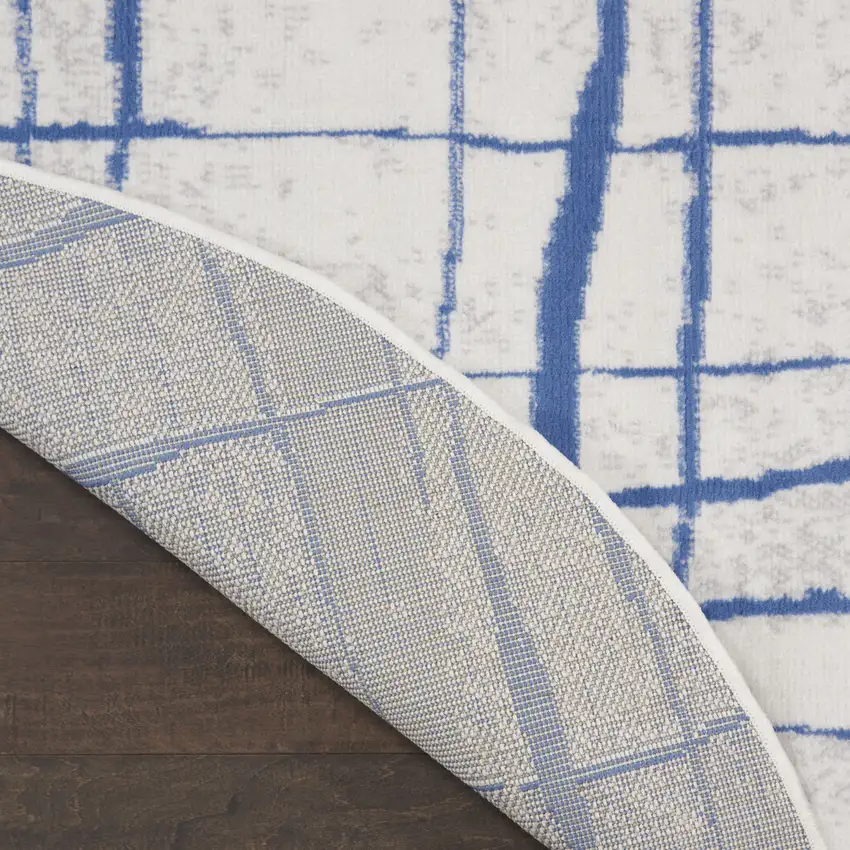 5' Ivory and Blue Abstract Geometric Distressed Round Rug Photo 9