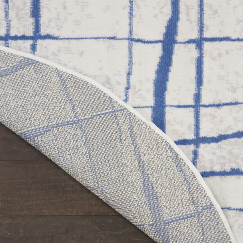 5' Ivory and Blue Abstract Geometric Distressed Round Rug Photo 7