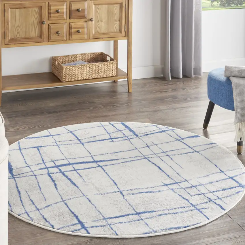 5' Ivory and Blue Abstract Geometric Distressed Round Rug Photo 8