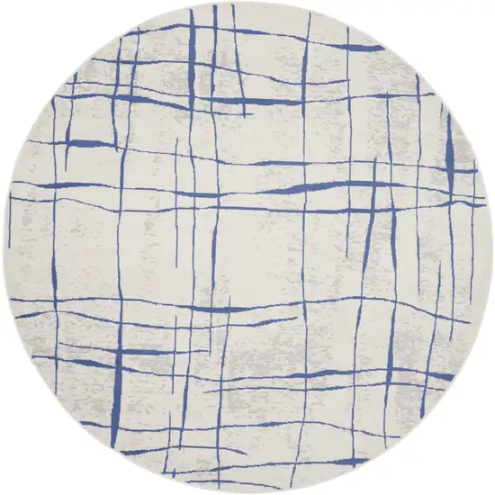 5' Ivory and Blue Abstract Geometric Distressed Round Rug Photo 8