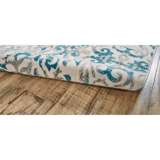8' Ivory and Blue Abstract Power Loom Runner Rug Photo 7