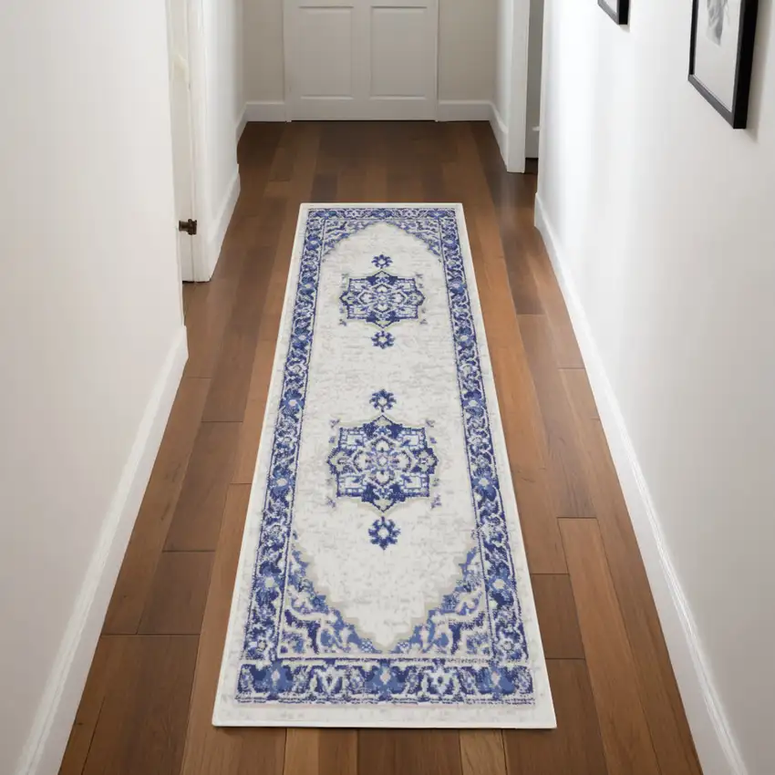 8' Ivory and Blue Floral Medallion Distressed Non Skid Runner Rug Photo 1