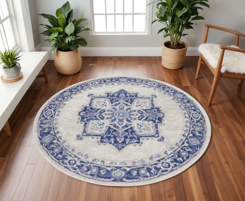 8' Ivory and Blue Floral Round Rug Photo 1