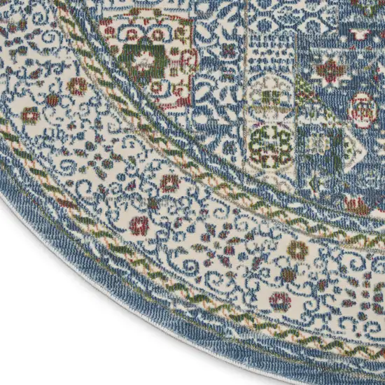 4' Ivory and Blue Geometric Distressed Non Skid Round Rug Photo 9