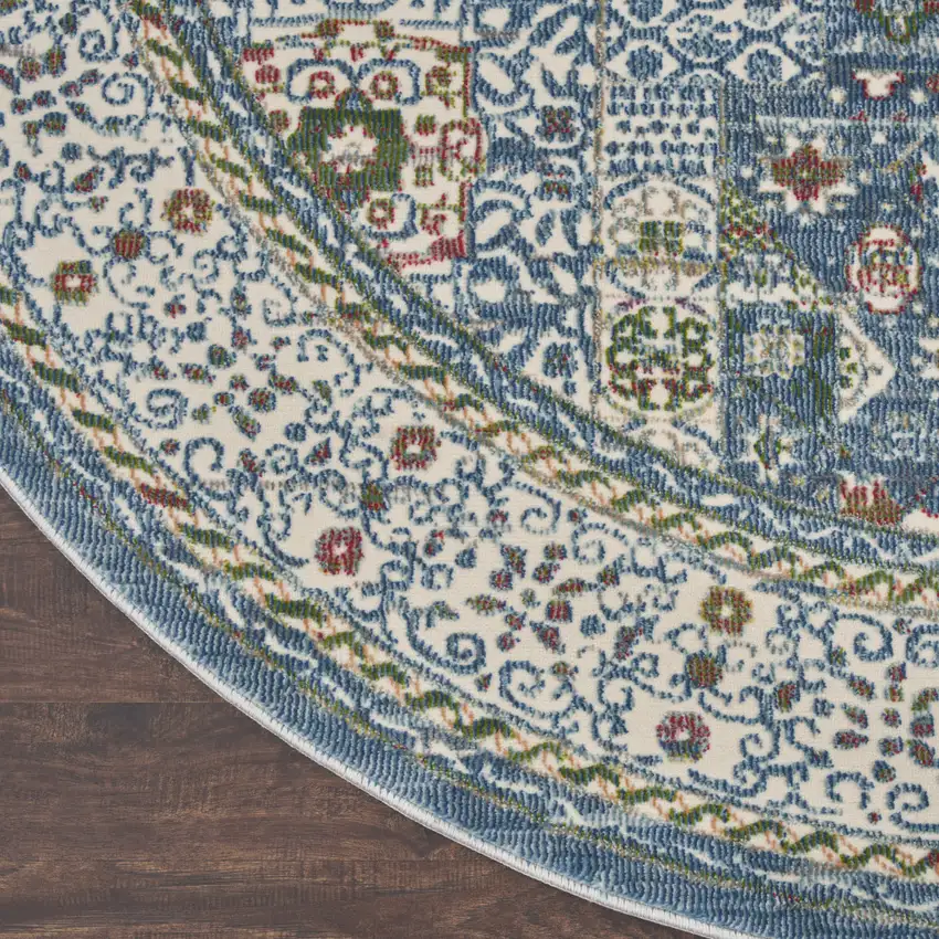 4' Ivory and Blue Geometric Distressed Non Skid Round Rug Photo 4