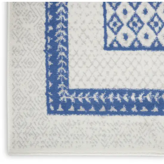 8' Ivory and Blue Geometric Distressed Non Skid Runner Rug Photo 7