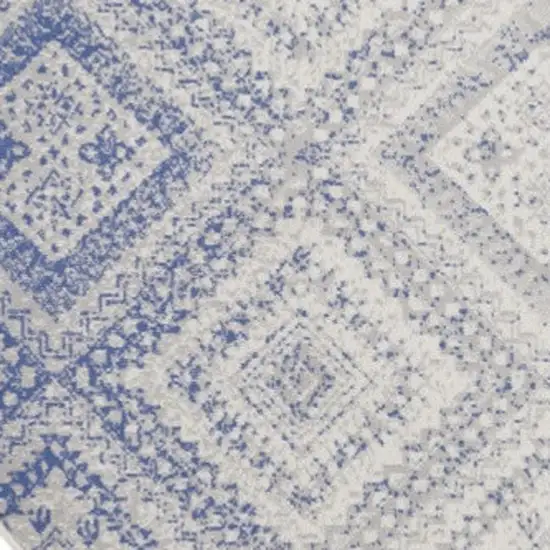 8' Ivory and Blue Geometric Distressed Round Rug Photo 8