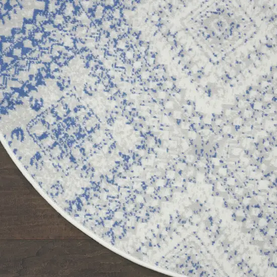 8' Ivory and Blue Geometric Distressed Round Rug Photo 8