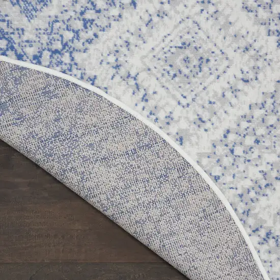 5' Ivory and Blue Geometric Distressed Round Rug Photo 8