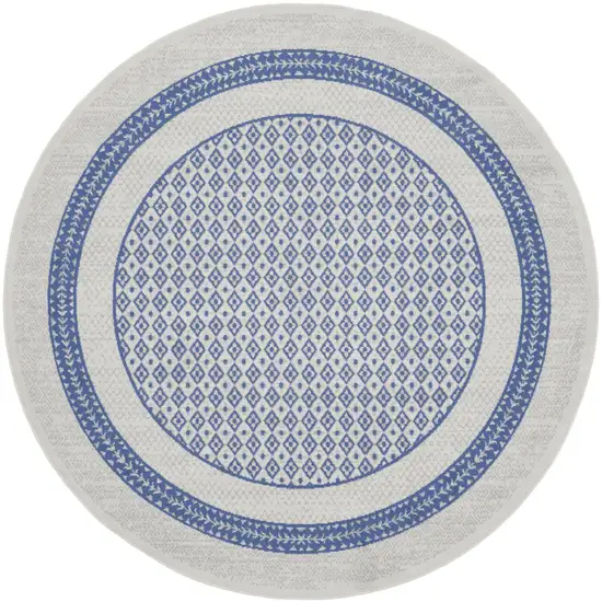 8' Ivory and Blue Geometric Distressed Round Rug Photo 1