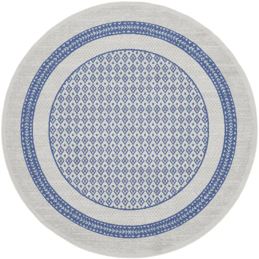 8' Ivory and Blue Geometric Distressed Round Rug Photo 1