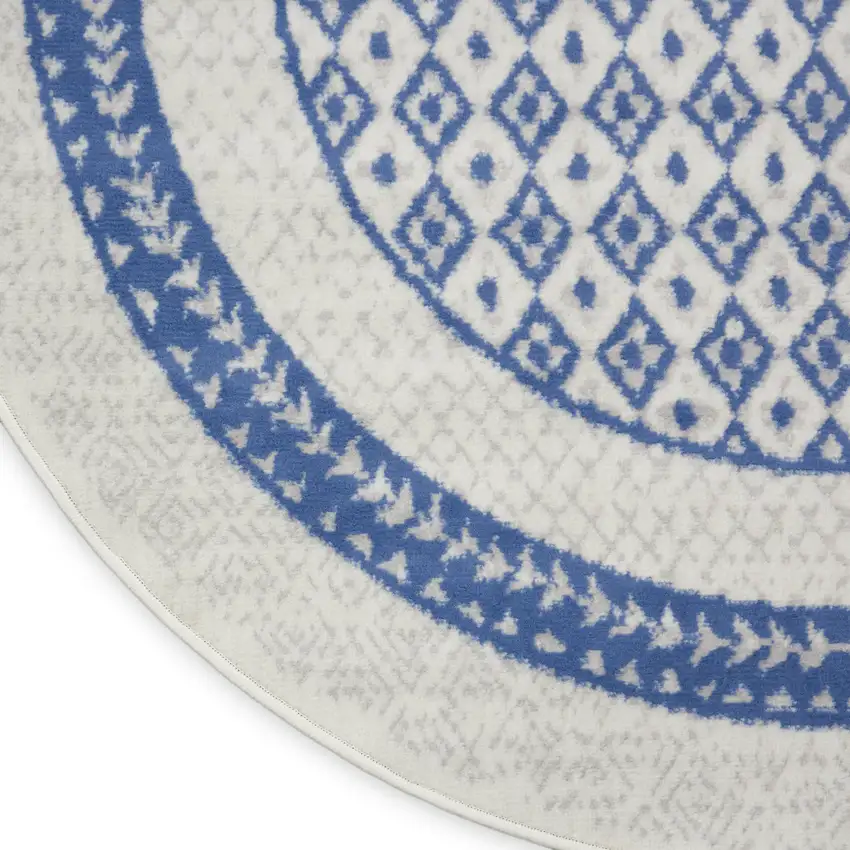 5' Ivory and Blue Geometric Distressed Round Rug Photo 9