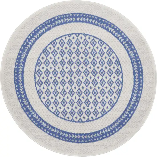 5' Ivory and Blue Geometric Distressed Round Rug Photo 1