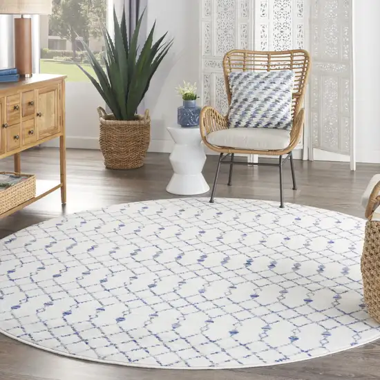 8' Ivory and Blue Geometric Round Rug Photo 5