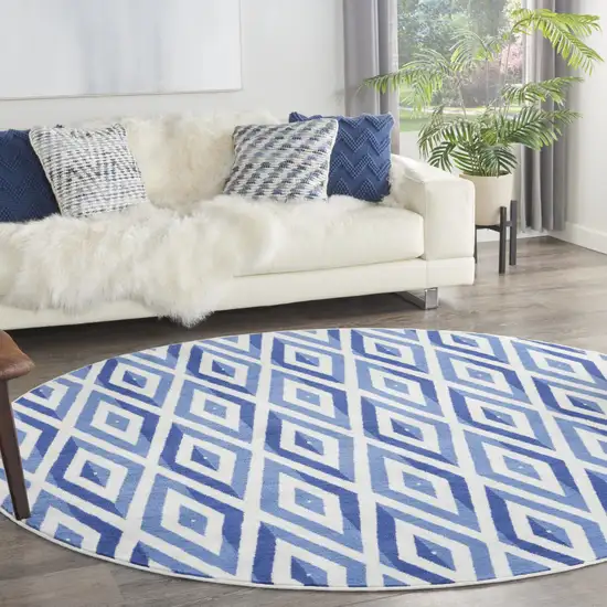 8' Ivory and Blue Geometric Round Rug Photo 5