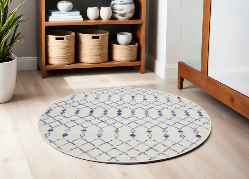 5' Ivory and Blue Geometric Round Rug Photo 1