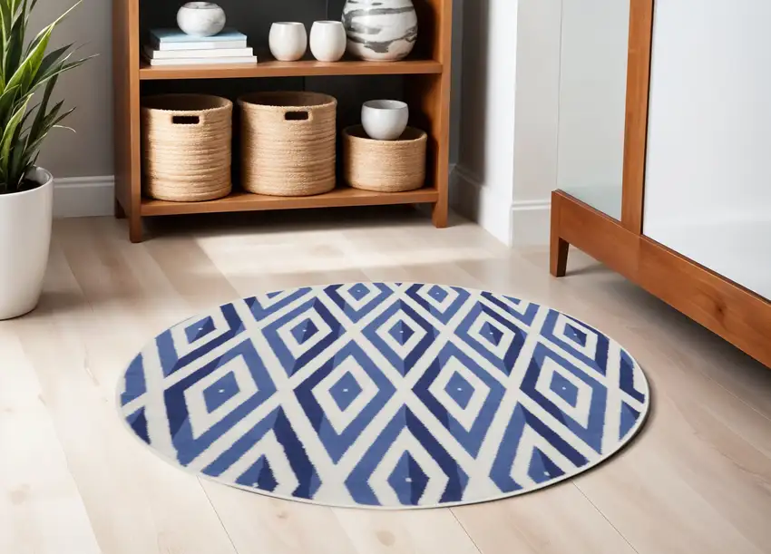 5' Ivory and Blue Geometric Round Rug Photo 1