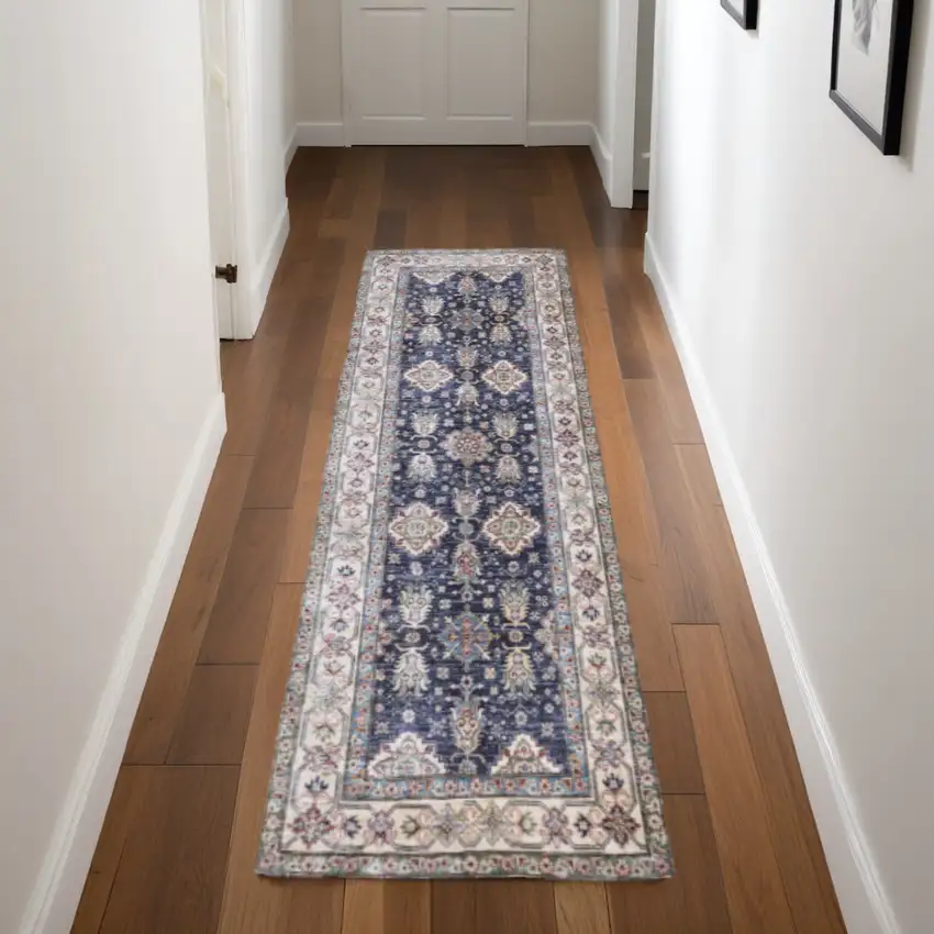 8' Ivory and Blue Oriental Distressed Non Skid Runner Rug Photo 1