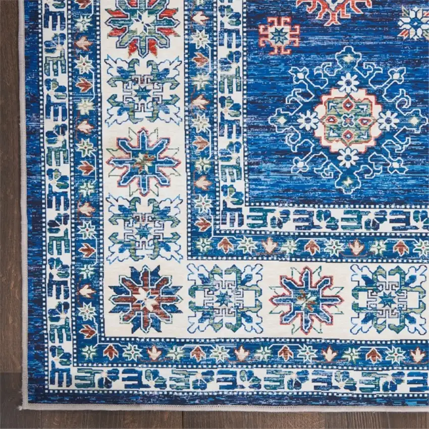 8' Ivory and Blue Oriental Distressed Non Skid Runner Rug Photo 7
