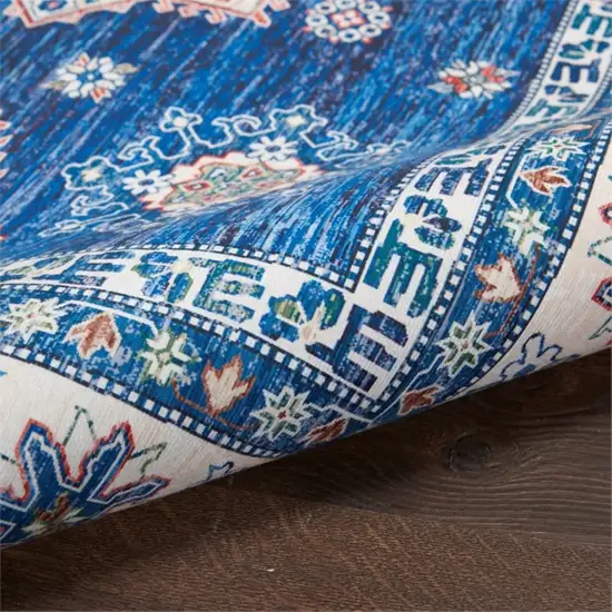8' Ivory and Blue Oriental Distressed Non Skid Runner Rug Photo 5