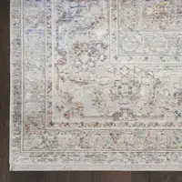 Photo of 12' Ivory and Blue Oriental Power Loom Distressed Runner Rug With Fringe