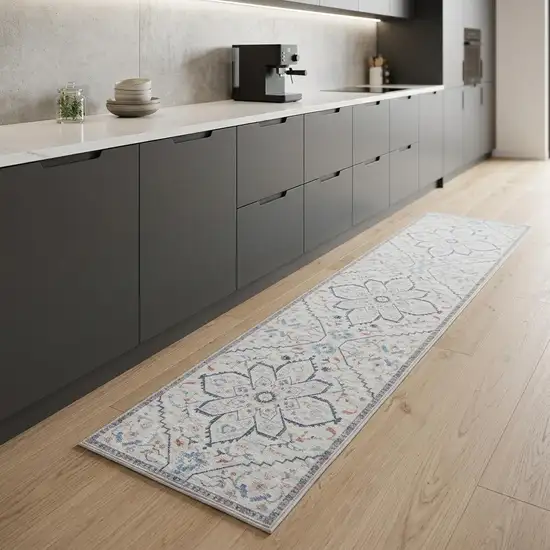 8' Ivory and Blue Oriental Power Loom Washable Runner Rug Photo 1