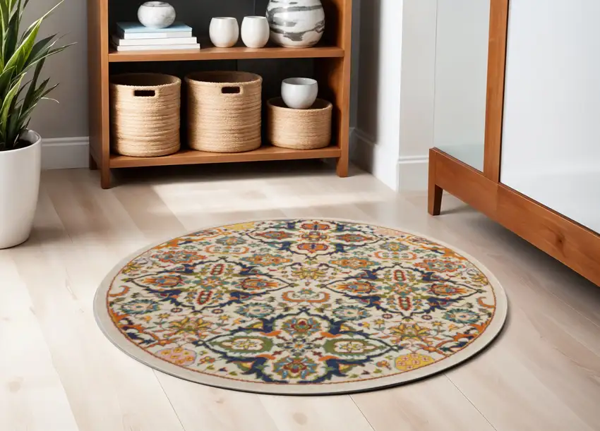 5' Ivory and Blue Round Floral Power Loom Area Rug Photo 1