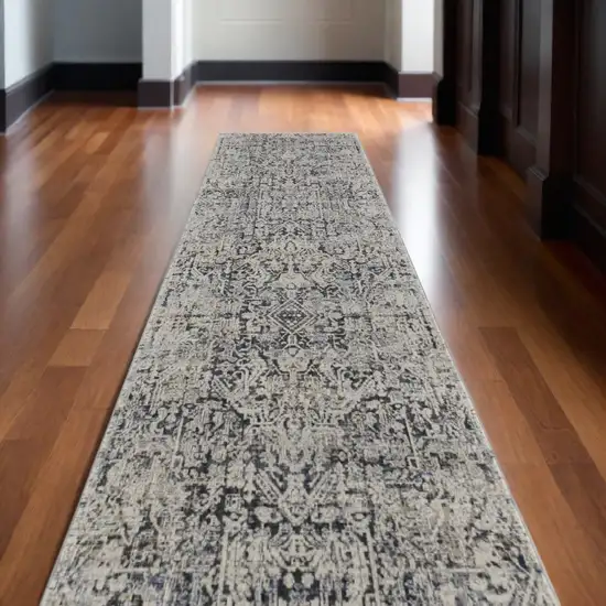 10' Ivory and Gray Abstract Power Loom Worn Faded Runner Rug With Fringe Photo 1