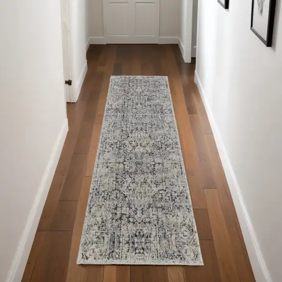 8' Ivory and Gray Abstract Power Loom Worn Faded Runner Rug With Fringe Photo 1